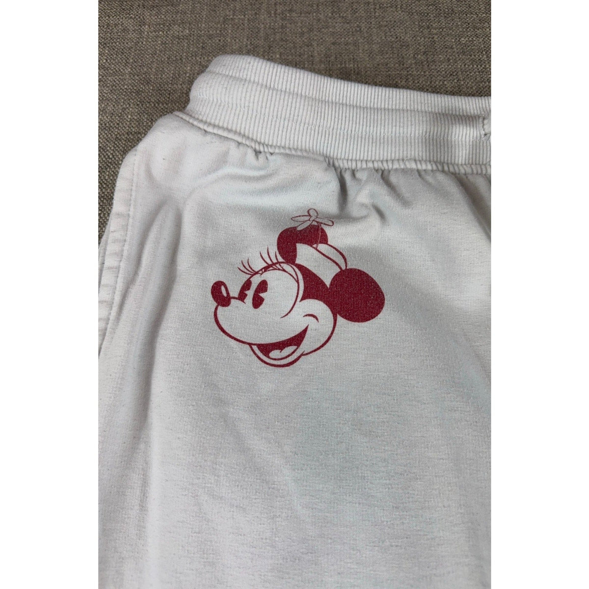 Second Half Supply Co, LLC light gray jogger sweatpants featuring a burgundy Minnie Mouse graphic on the hip