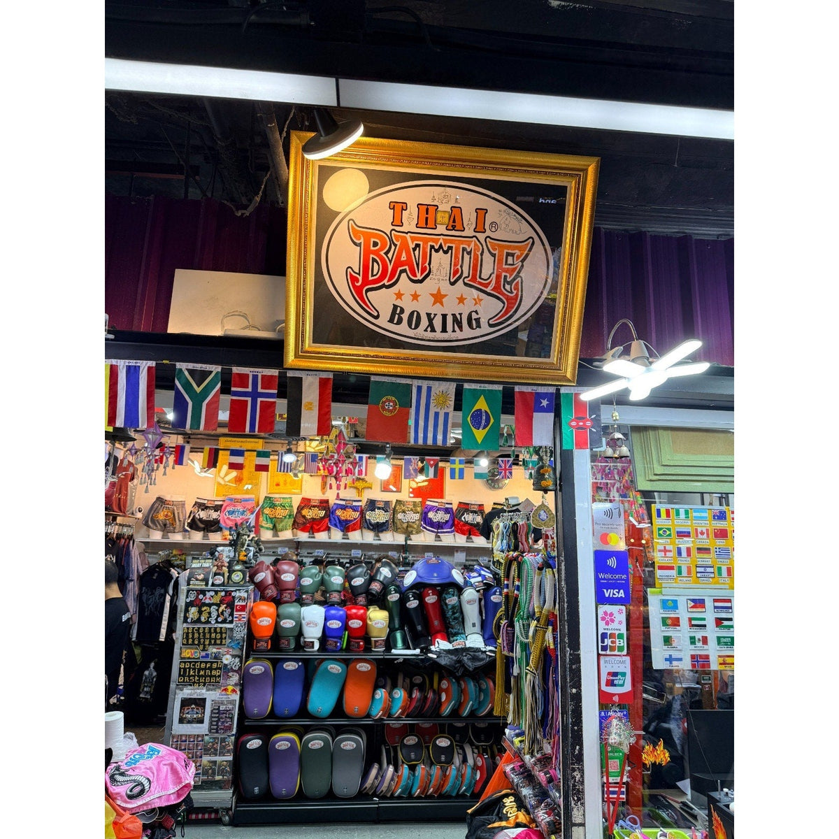 Second Half Supply Co, LLC storefront in Bangkok featuring Thai Battle Boxing Muay Thai shorts and training equipment