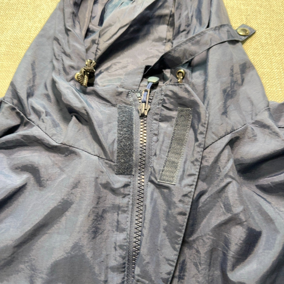 Second Half Supply Co, LLC vintage navy blue The North Face anorak jacket hood with zipper and storm flap detail