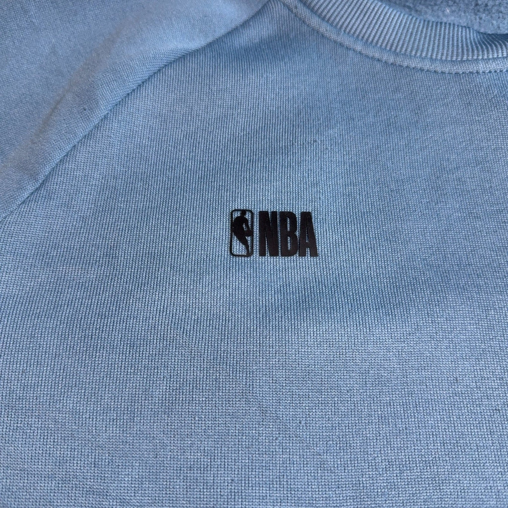 Second Half Supply Co, LLC blue crewneck sweatshirt featuring a small black NBA logo on the chest