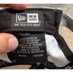 Second Half Supply Co, LLC New Era 9TWENTY cap interior tag showing polyester material and manufacturing details