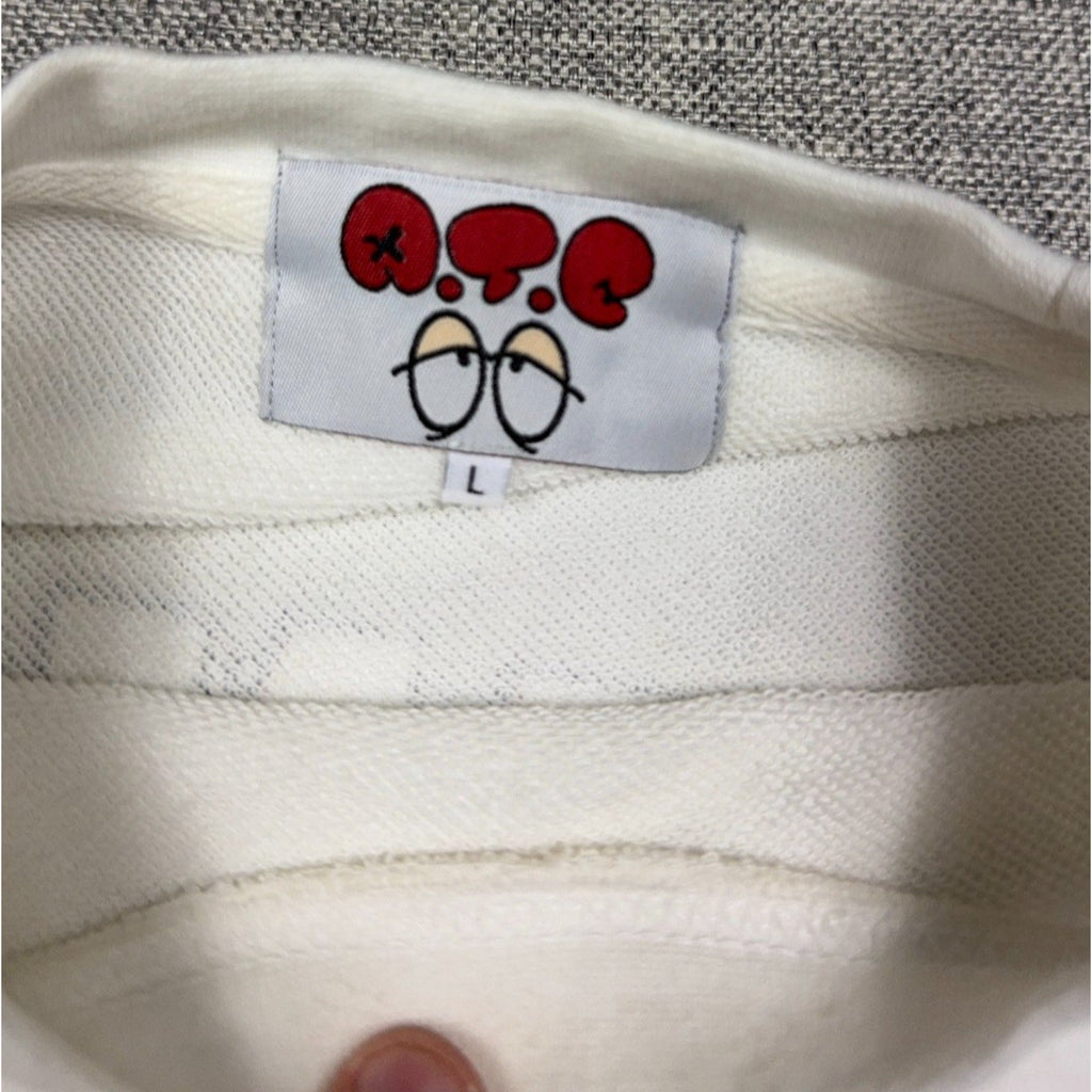 Second Half Supply Co, LLC white New Jack ATC sweatshirt interior neck label with cartoon eyes graphic and size L tag