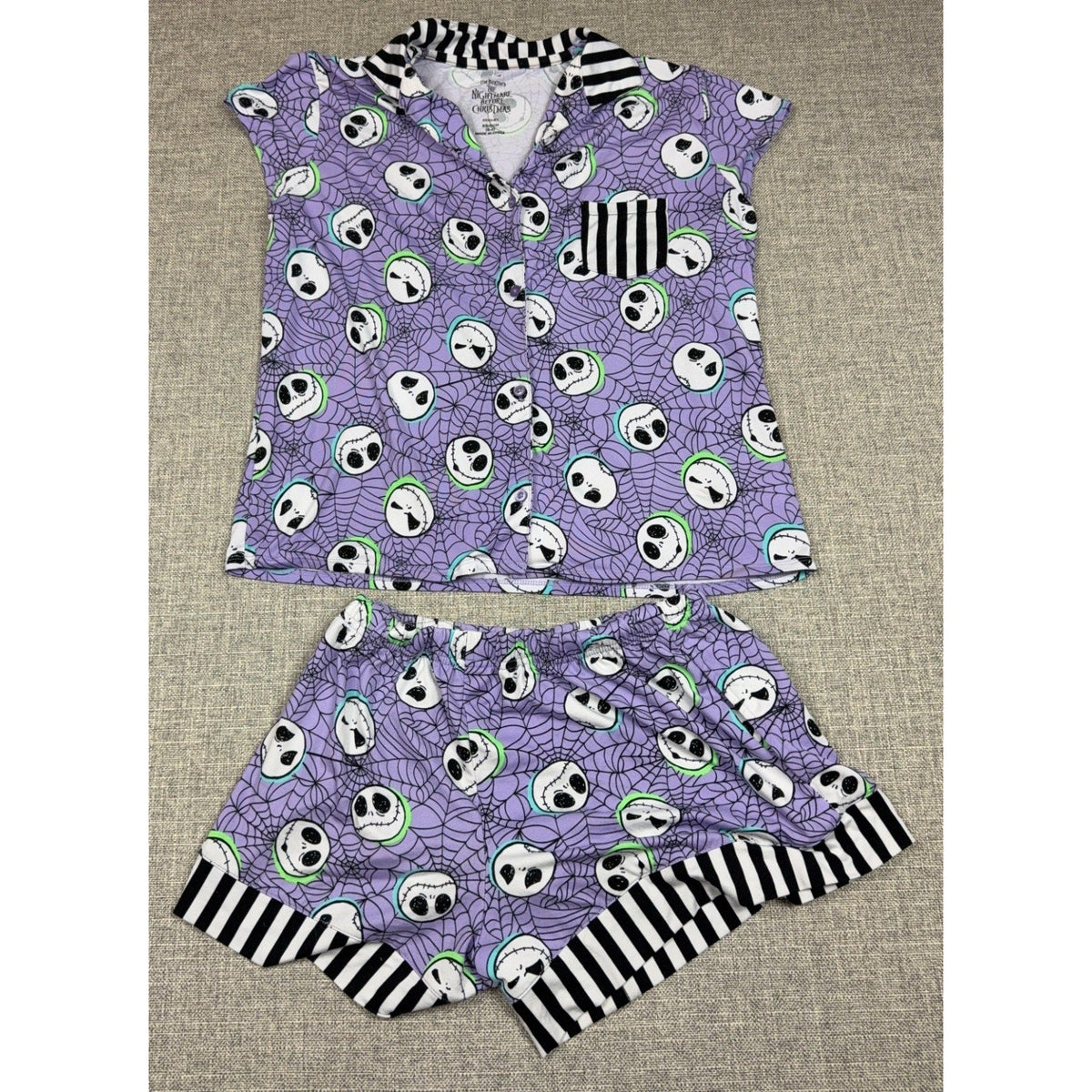 Second Half Supply Co, LLC Disney Nightmare Before Christmas purple pajama set with Jack Skellington spiderweb print