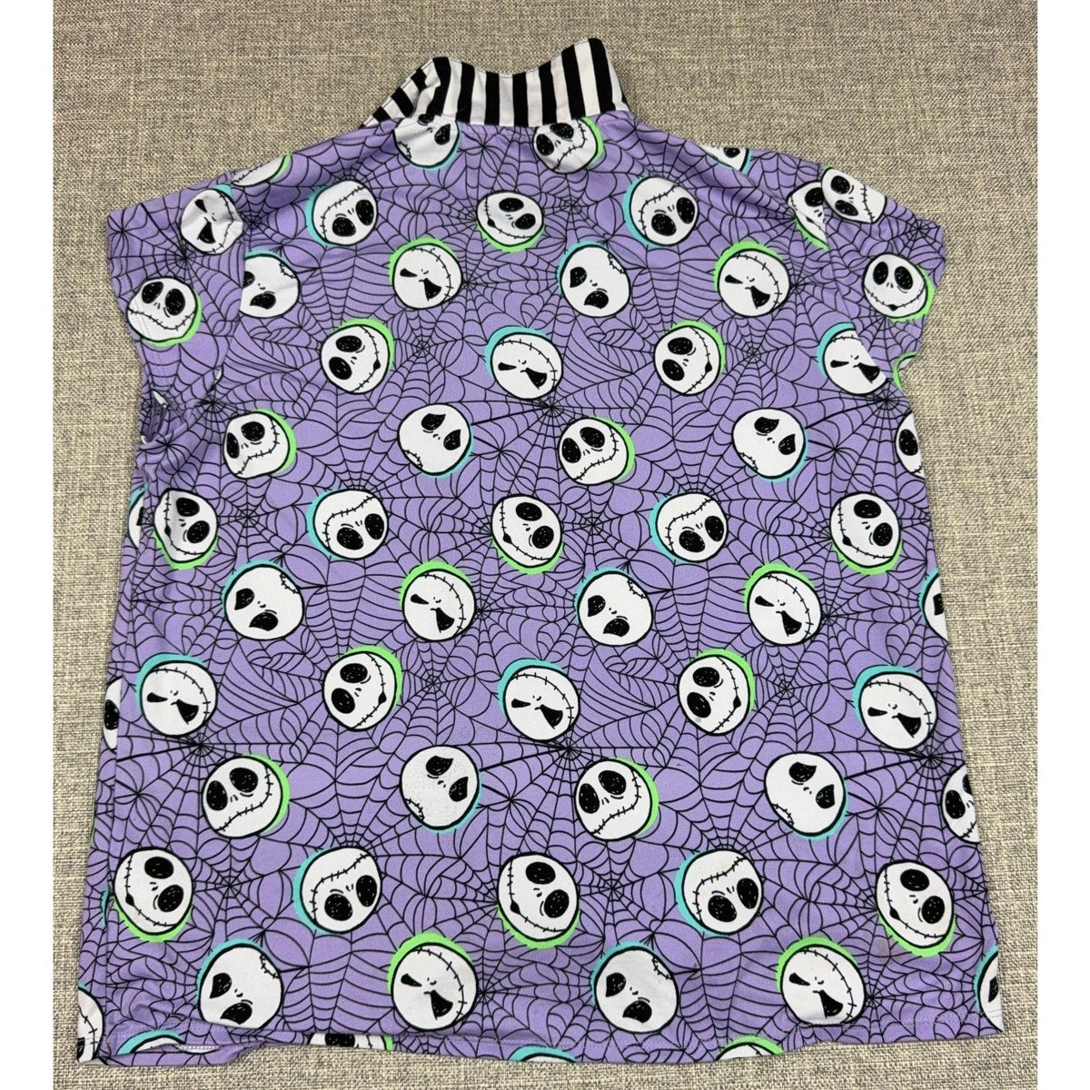 Second Half Supply Co, LLC purple Nightmare Before Christmas pajama top with Jack Skellington and spiderweb print