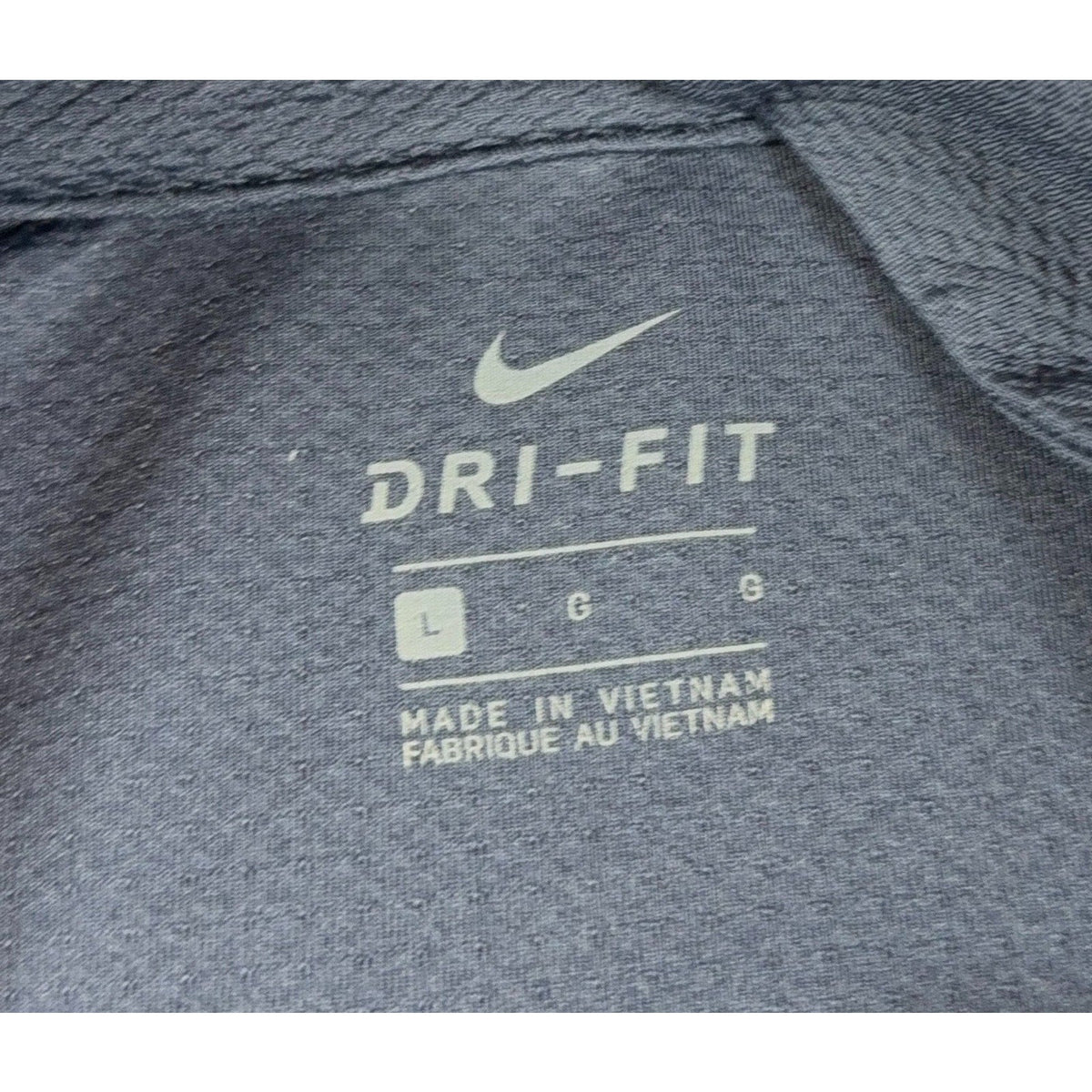 Second Half Supply Co, LLC Nike Dri-FIT navy blue golf pullover interior size label showing size Large
