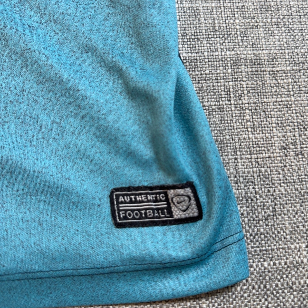 Second Half Supply Co, LLC Nike Manchester City training shirt featuring a turquoise Dri-FIT authentic football patch