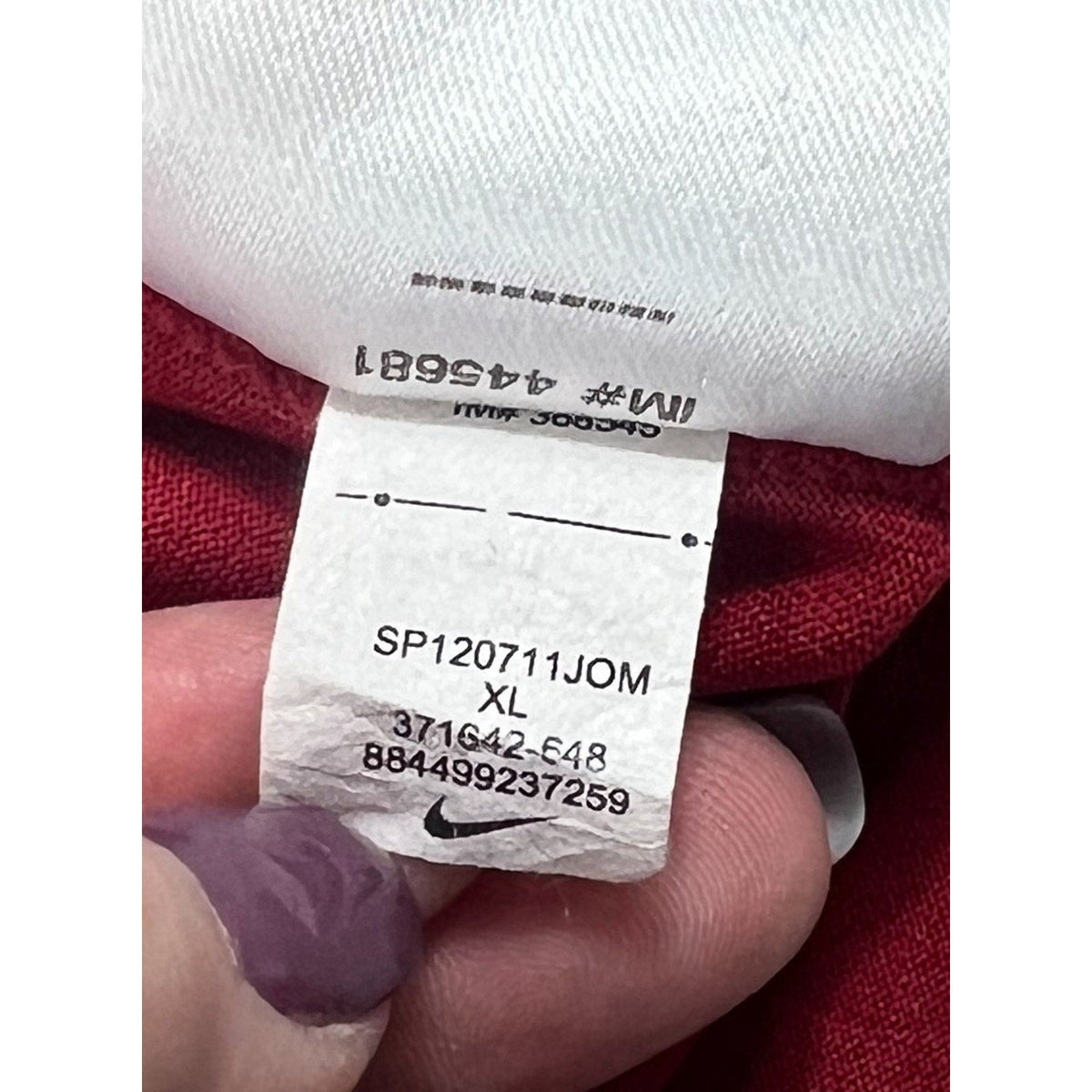 Second Half Supply Co, LLC Nike 2012 Dallas Cup shirt interior care tag showing size XL and style number 371642-648