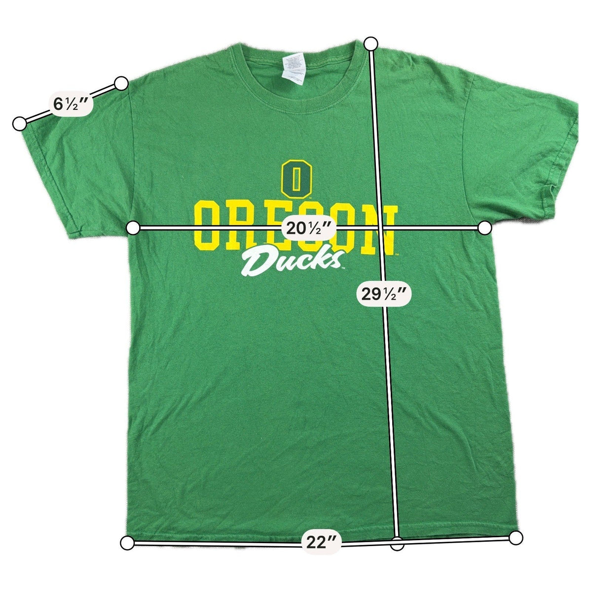 Second Half Supply Co, LLC green Oregon Ducks graphic T-shirt with yellow and white logo and measurements overlay.