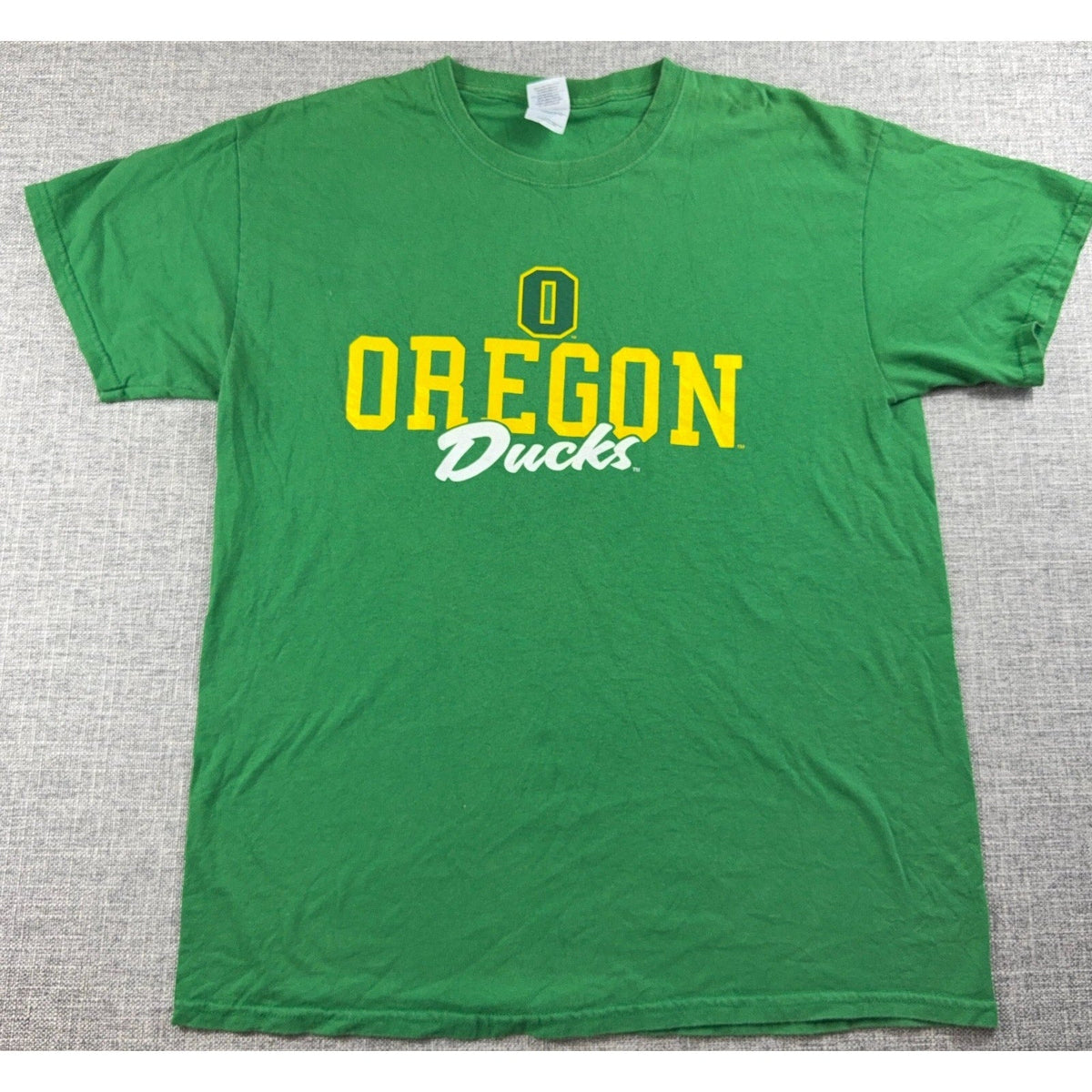 Second Half Supply Co, LLC green Oregon Ducks graphic T-shirt with yellow and white college football logo