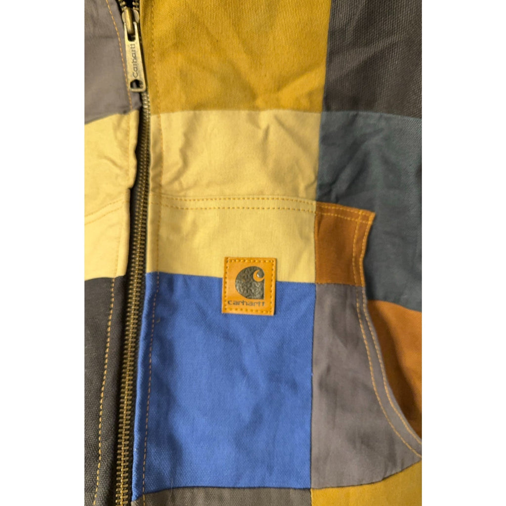 Second Half Supply Co, LLC reworked Carhartt jacket featuring a colorful patchwork design with a square logo patch.