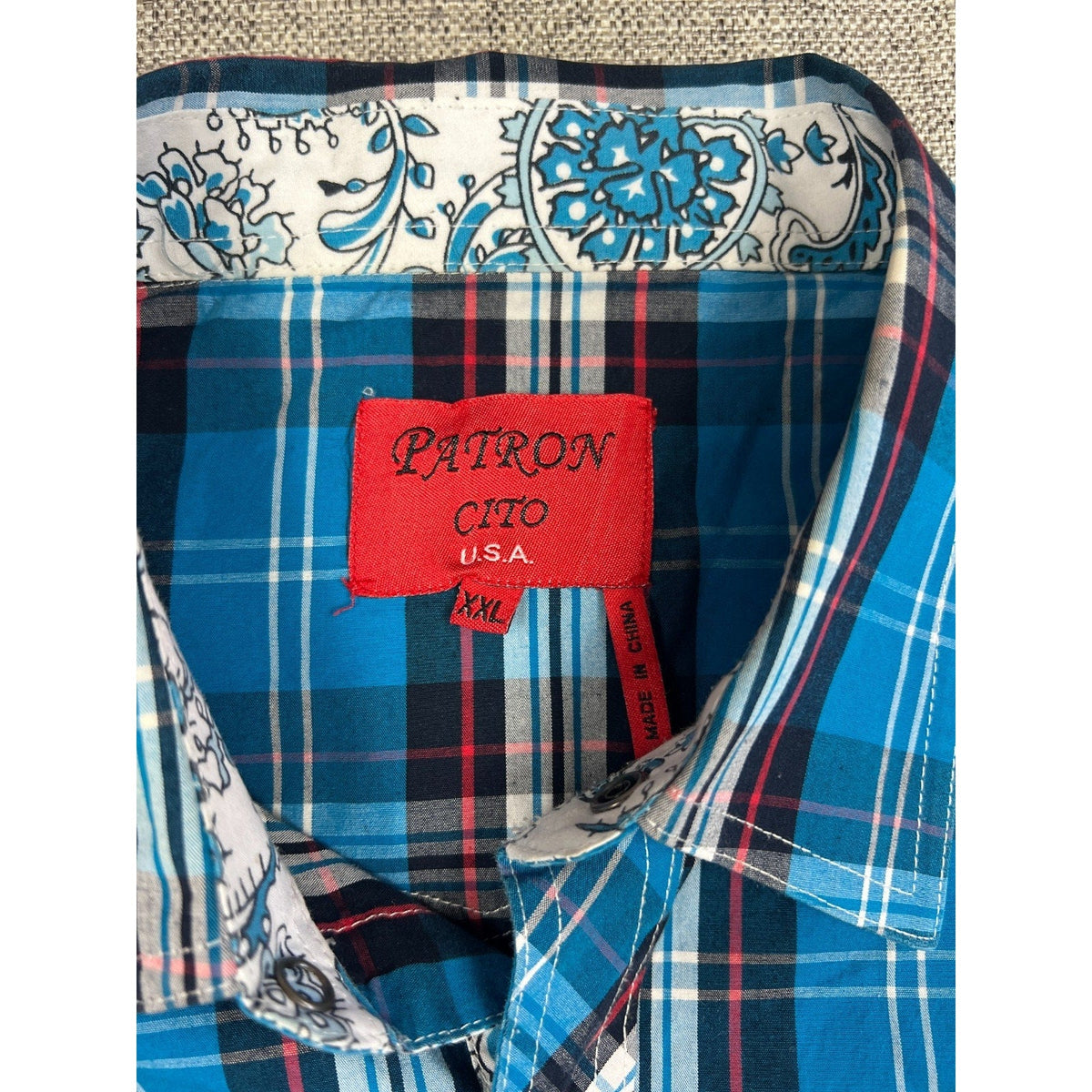 Second Half Supply Co, LLC Patroncito USA blue plaid Western shirt with paisley print collar and red brand label