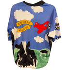 Second Half Supply Co, LLC vintage Pearl Izumi Ben & Jerry's cycling jersey featuring cow and airplane graphic