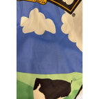 Second Half Supply Co, LLC vintage Pearl Izumi cycling jersey with blue sky, white clouds, and cow pasture graphic