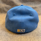 Second Half Supply Co, LLC light blue Myrtle Beach Pelicans 59FIFTY fitted hat showing the rear MiLB logo