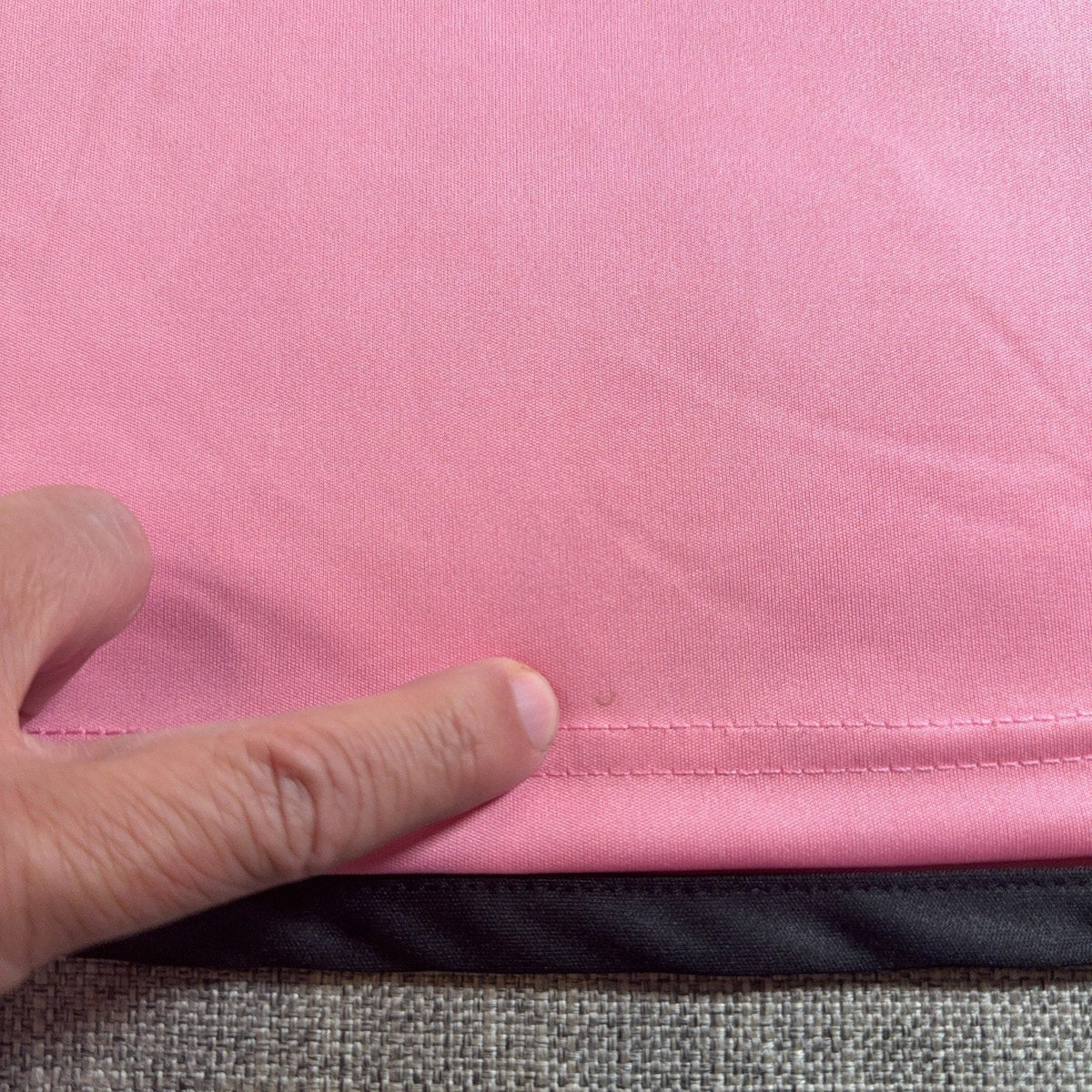 Second Half Supply Co, LLC pink Adidas Inter Miami jersey showing a small mark near the front hem