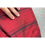 Second Half Supply Co, LLC red and black plaid silk tunic shirt showing small fabric snags on the material