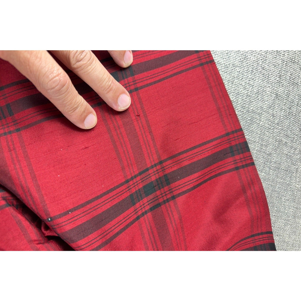 Second Half Supply Co, LLC red and black plaid silk tunic shirt showing small fabric snags on the material