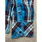 Second Half Supply Co, LLC blue plaid Western shirt cuff with black snap buttons and contrast paisley lining