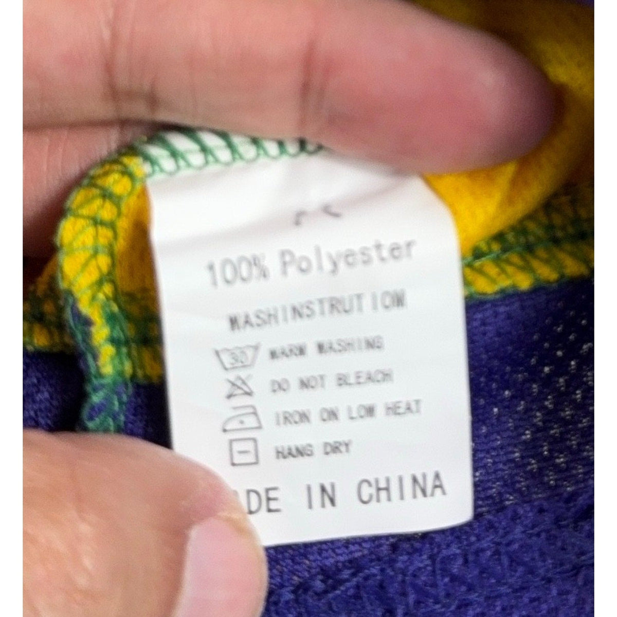 Second Half Supply Co, LLC Mighty Ducks jersey 100 percent polyester care label with washing instructions