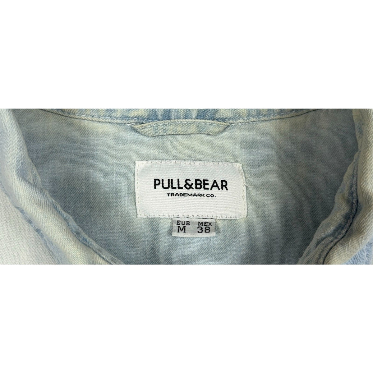 Second Half Supply Co, LLC Pull&Bear light wash denim shirt size M collar tag detail showing brand and size