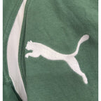 Second Half Supply Co, LLC green and white Puma rugby shirt with embroidered logo detail