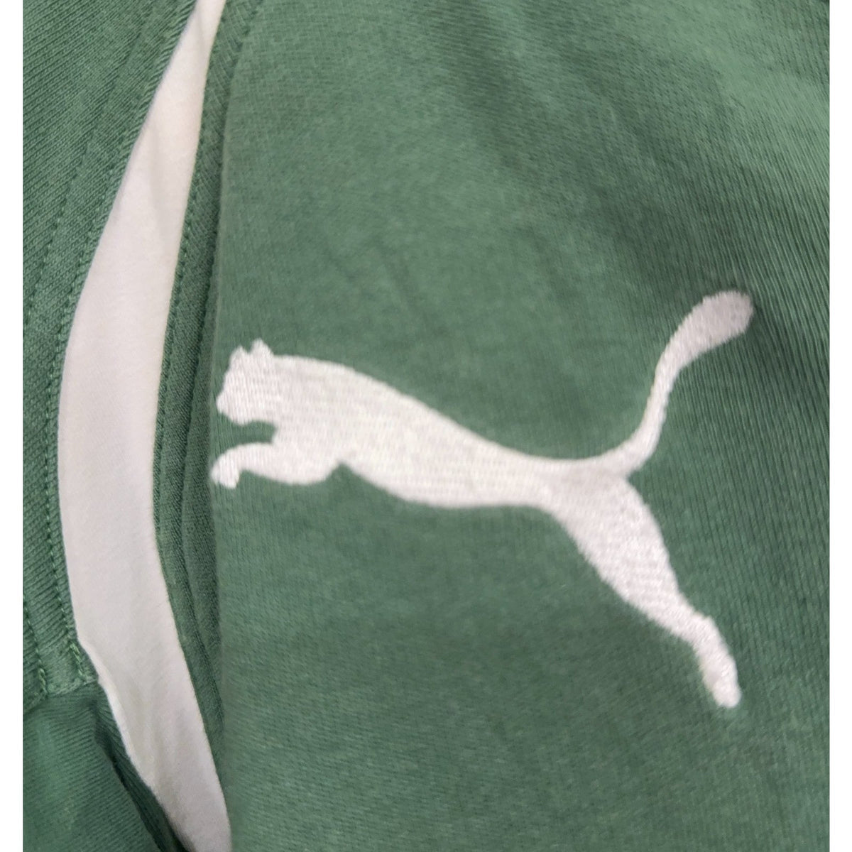 Second Half Supply Co, LLC green and white Puma rugby shirt with embroidered logo detail