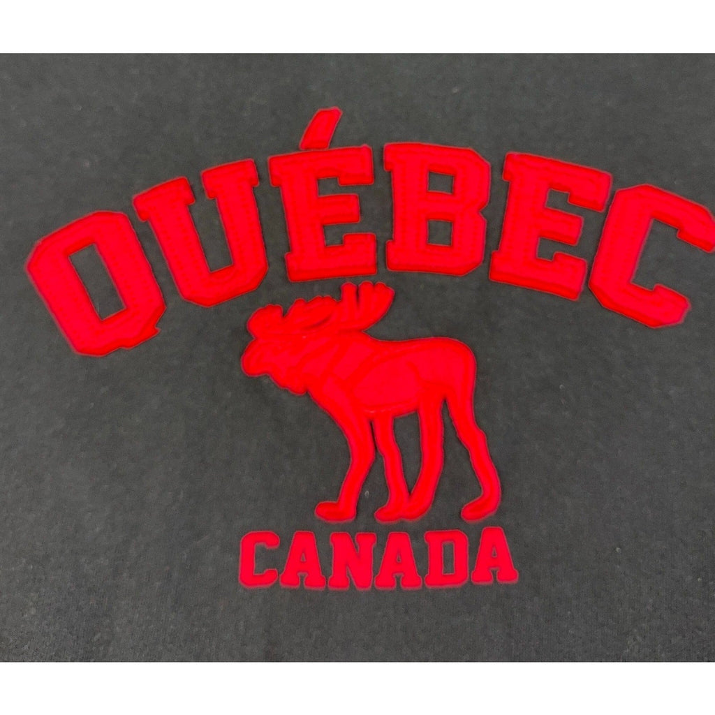 Second Half Supply Co, LLC black sweatshirt featuring red varsity-style Quebec Canada moose appliqué lettering