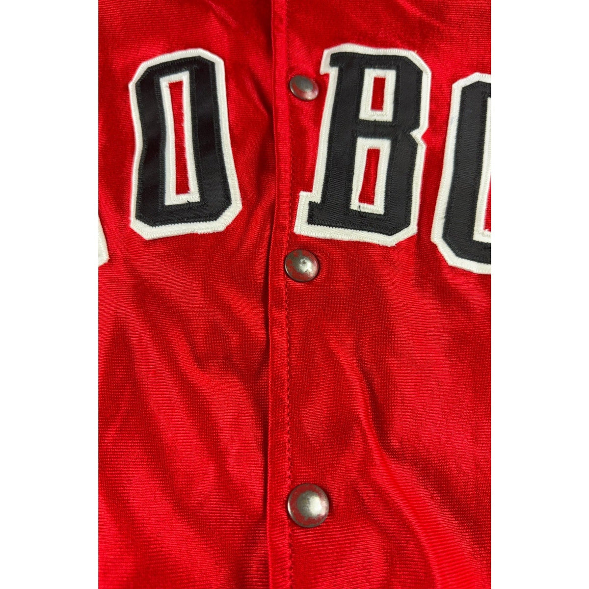 Second Half Supply Co, LLC vintage red satin varsity jacket with black and white Lobos appliqué lettering