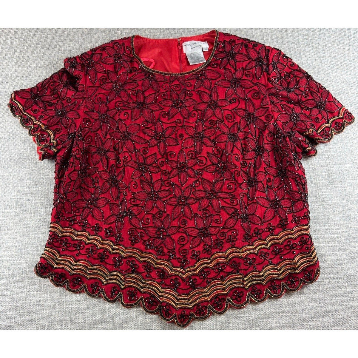 Second Half Supply Co, LLC vintage red silk blouse with black floral beading and gold scalloped hem and sleeve trim.