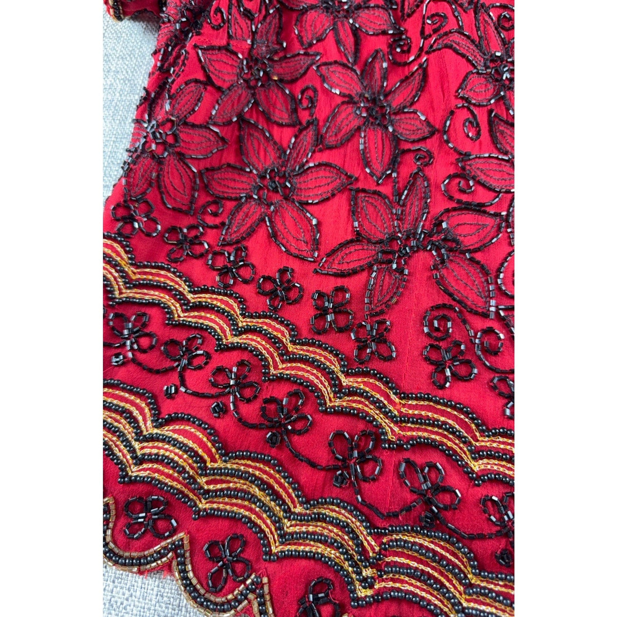 Second Half Supply Co, LLC vintage red silk top with black floral beadwork and gold scalloped hem detail