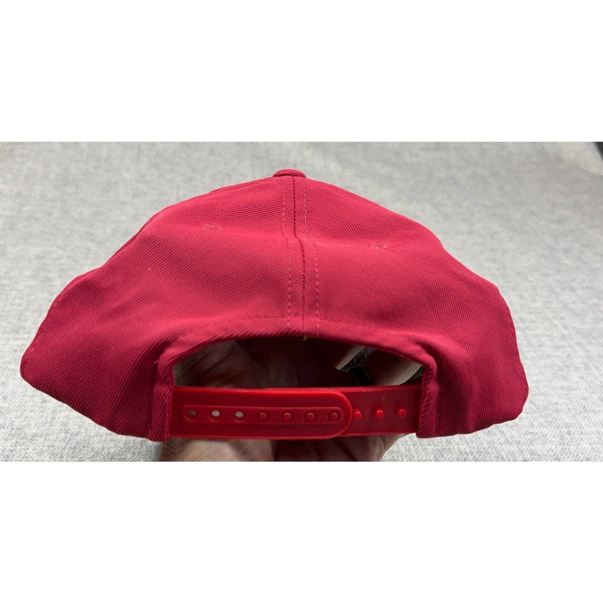 Second Half Supply Co, LLC red Adidas snapback hat with adjustable plastic strap closure, rear view