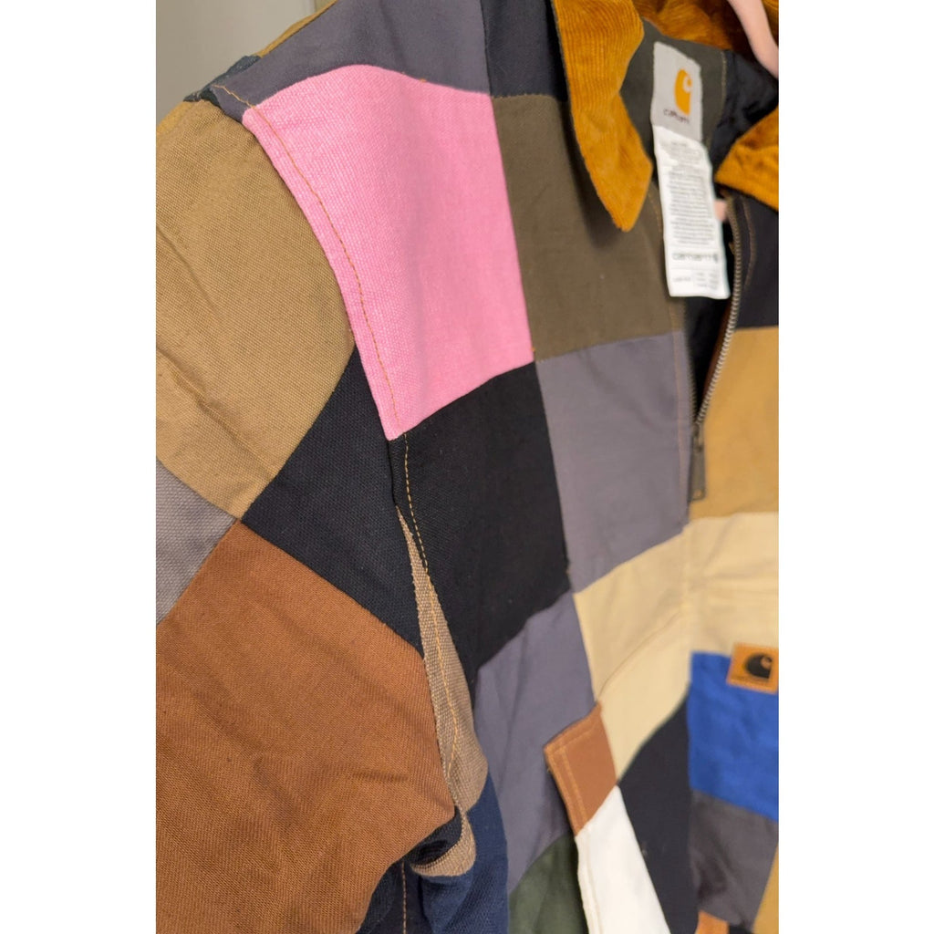 Second Half Supply Co, LLC reworked Carhartt patchwork jacket with pink, blue, and earth-tone panels and corduroy collar