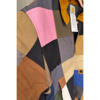 Second Half Supply Co, LLC reworked Carhartt patchwork jacket with pink, blue, and earth-tone panels and corduroy collar