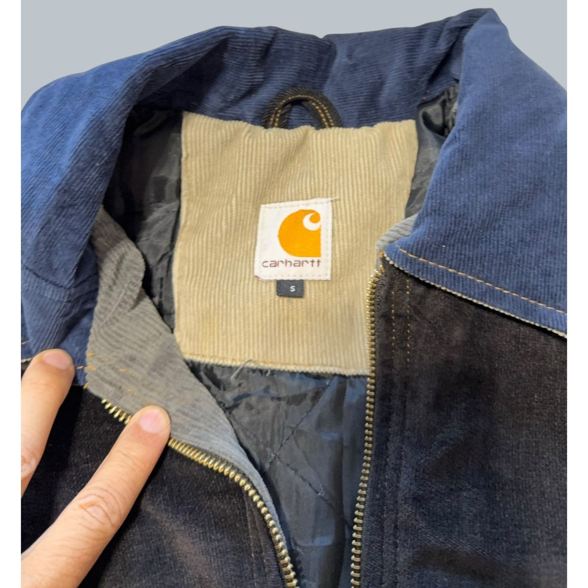 Second Half Supply Co, LLC reworked Carhartt patchwork jacket with blue corduroy collar and quilted lining
