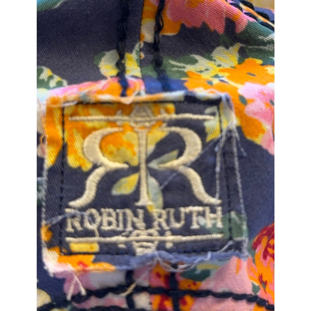 Second Half Supply Co, LLC Robin Ruth floral baseball cap interior label with navy quilted cotton fabric