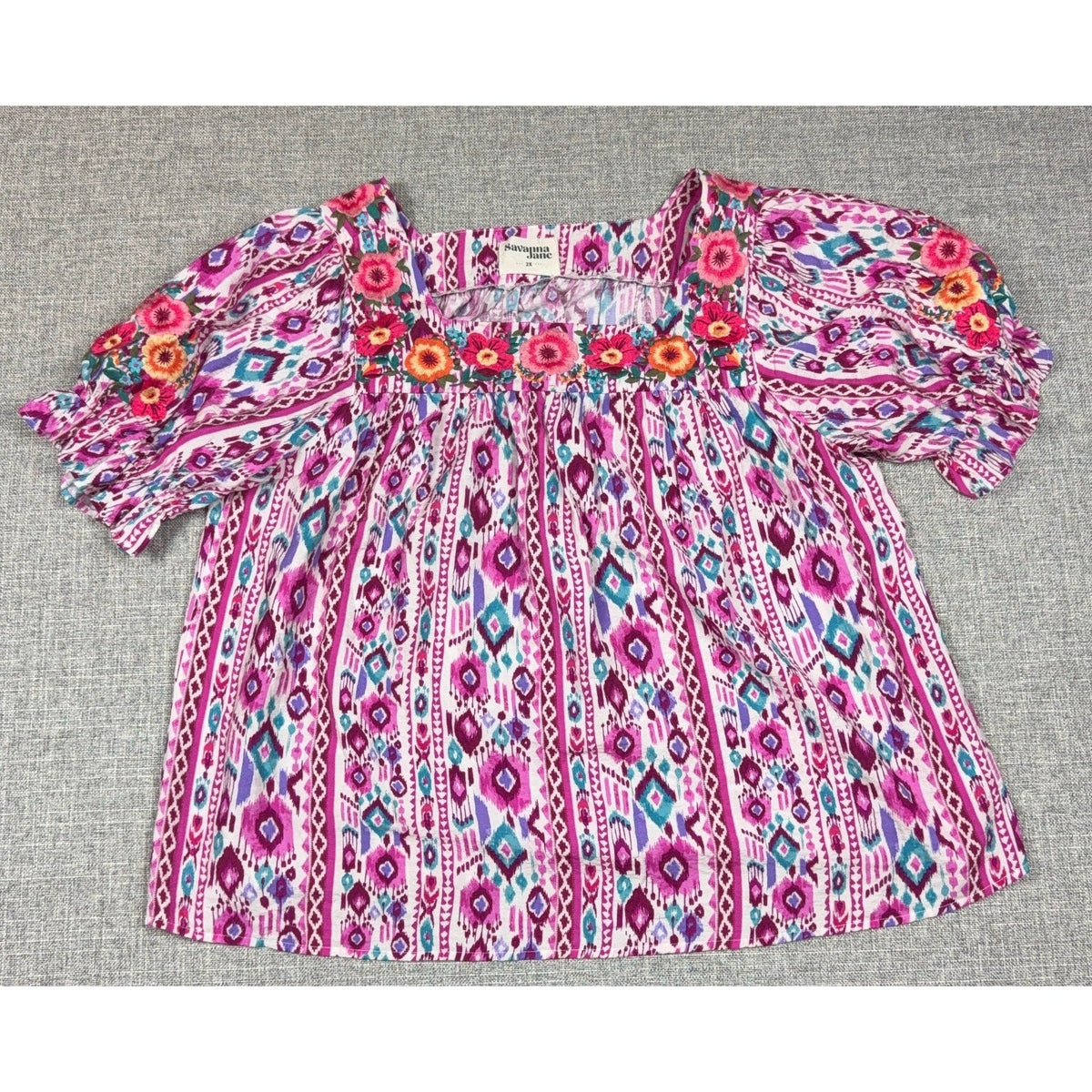 Second Half Supply Co, LLC plus size Savanna Jane boho tunic with magenta geometric print and floral embroidery