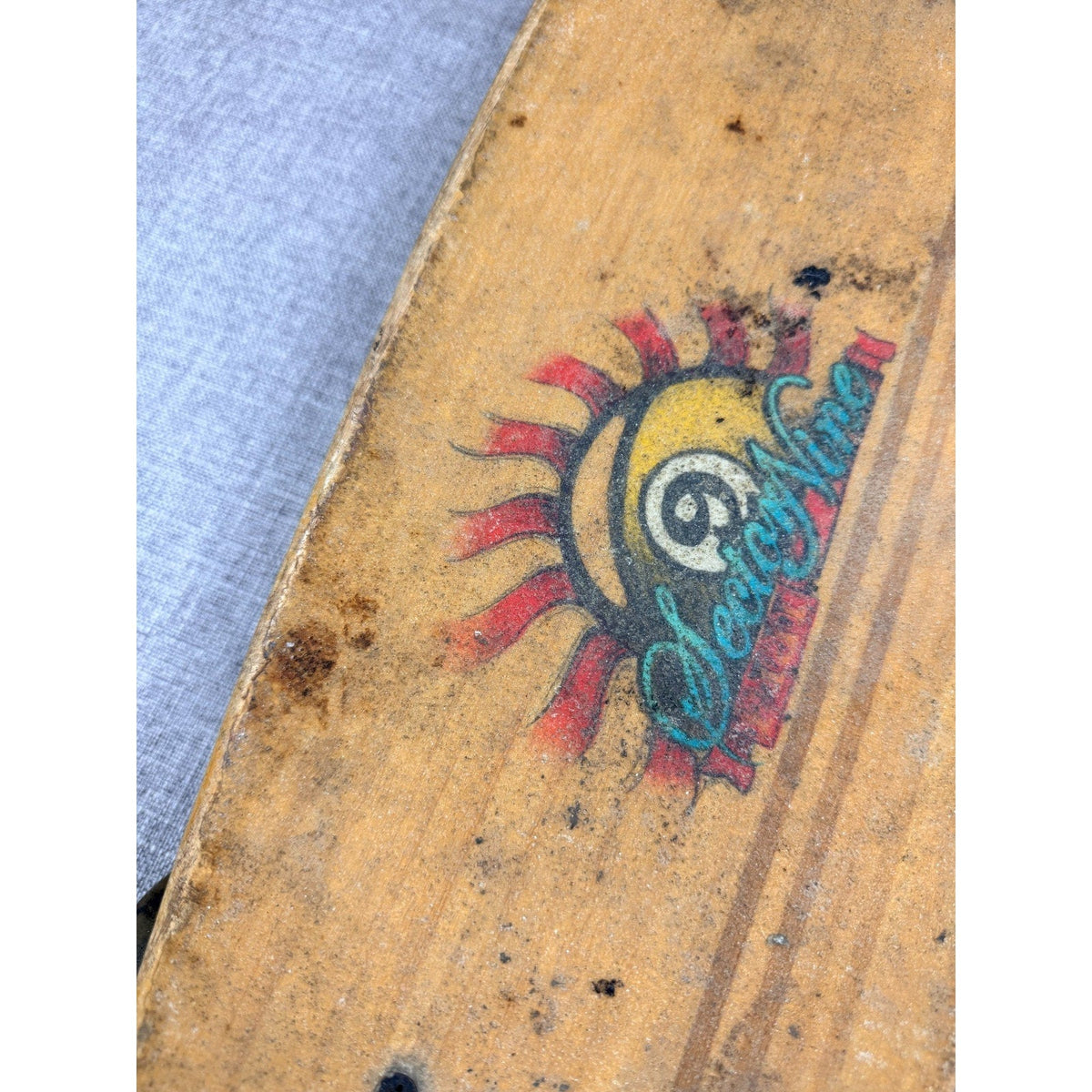 Second Half Supply Co, LLC Sector 9 bamboo longboard deck featuring vintage surf-inspired sun logo and wood grain