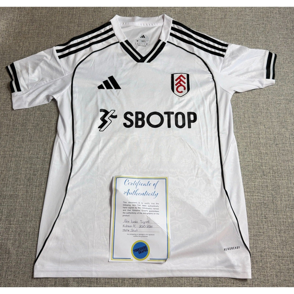 Second Half Supply Co, LLC signed Alex Iwobi Fulham 2025/26 home jersey with Yorkshire Graphs certificate of authenticity
