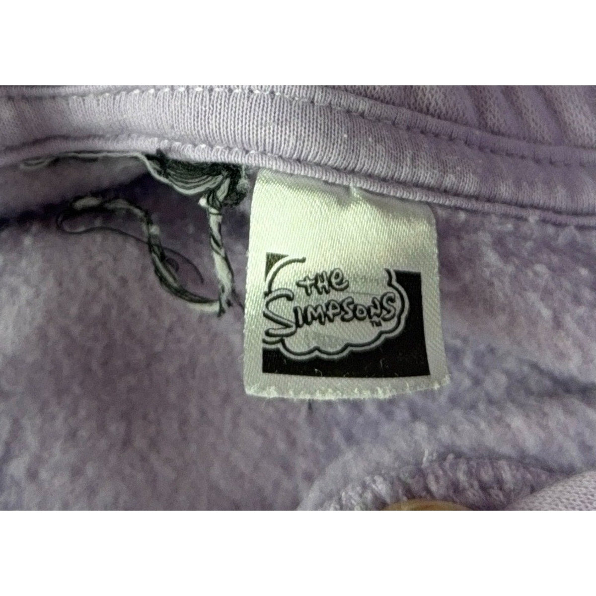 Second Half Supply Co, LLC lavender The Simpsons hoodie interior neck label with character branding
