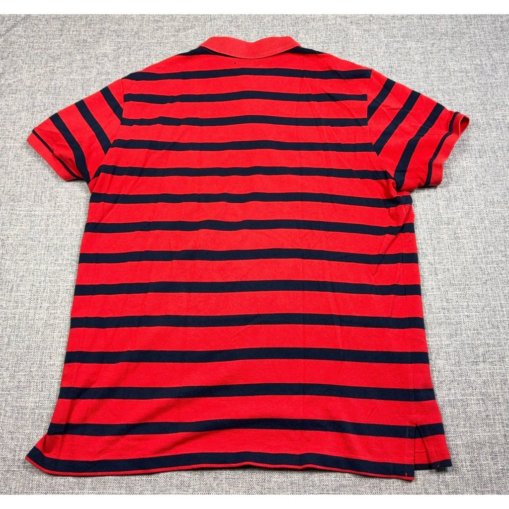 Second Half Supply Co, LLC red and navy striped cotton polo shirt, back view showing short sleeves and split hem