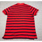 Second Half Supply Co, LLC red and navy striped cotton polo shirt, back view showing short sleeves and split hem