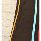 Second Half Supply Co, LLC black short sleeve button-up shirt with multicolor vertical stripes and a small fabric mark