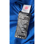 Second Half Supply Co, LLC Stussy windbreaker care label with polyester fabric details and washing instructions