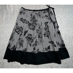 Second Half Supply Co, LLC Talbots cotton midi skirt featuring a black and white gingham print with floral motifs.