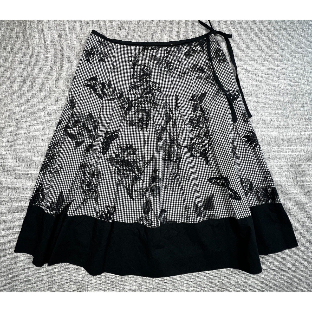 Second Half Supply Co, LLC Talbots cotton midi skirt featuring a black and white gingham print with floral motifs.