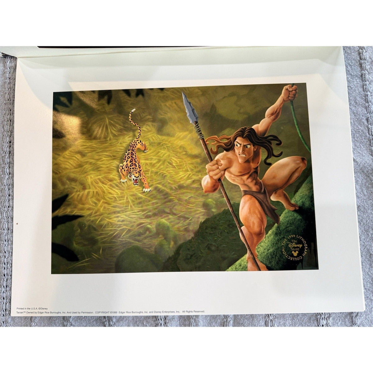 Second Half Supply Co, LLC 1999 Disney Tarzan lithograph print featuring Tarzan and Sabor in a jungle scene