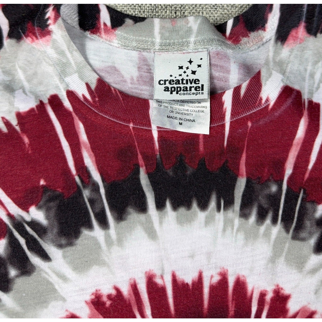 Second Half Supply Co, LLC Texas A&M Aggies tie dye t-shirt tag detail showing Creative Apparel Concepts branding
