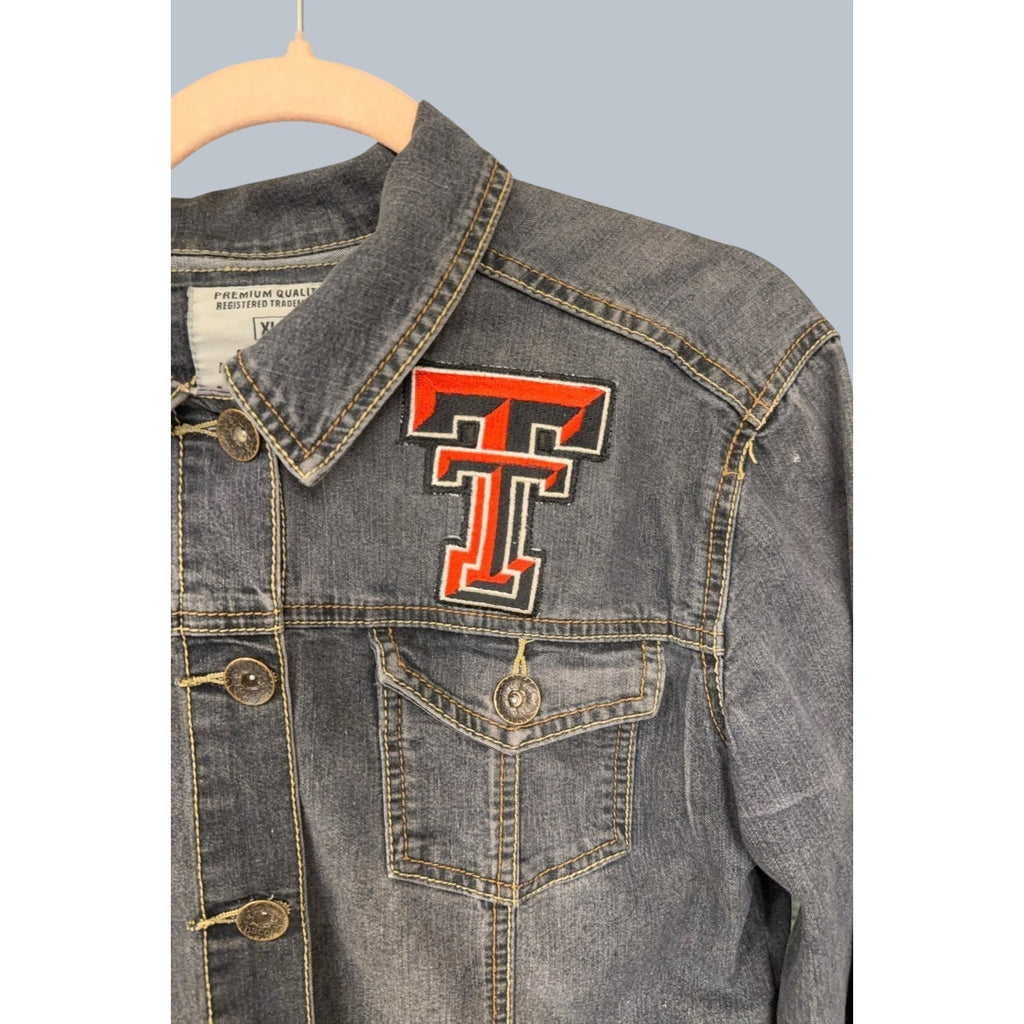 Second Half Supply Co, LLC vintage denim jacket with Texas Tech Double T chest patch and button-front closure