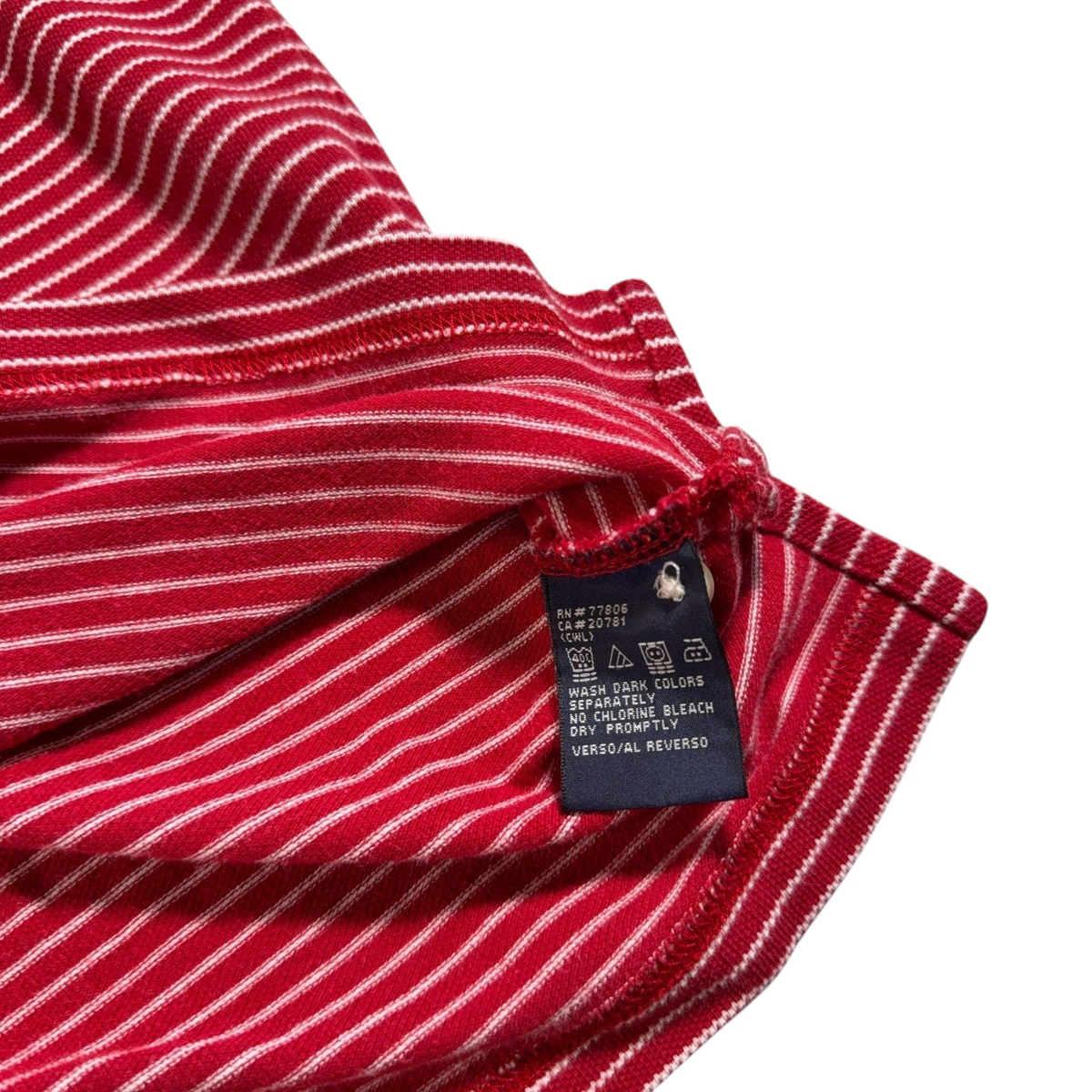 Second Half Supply Co, LLC vintage Tommy Hilfiger polo shirt interior care label with red and white striped fabric