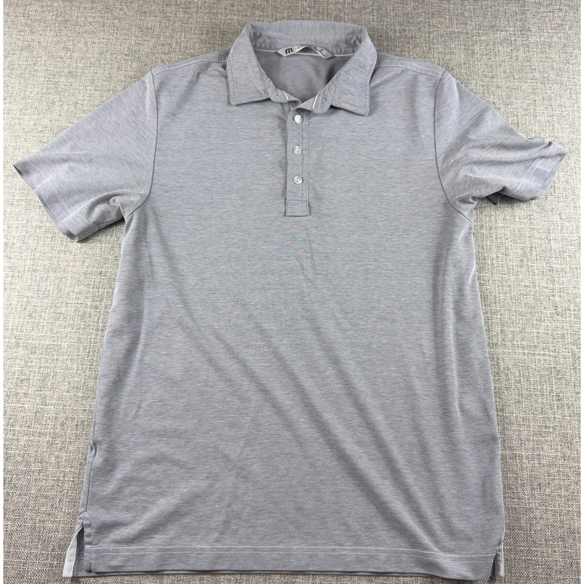 Second Half Supply Co, LLC men's TravisMathew heather gray short-sleeve performance golf polo shirt with button placket